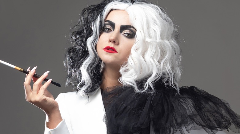 Woman dressed as Cruella De Vil