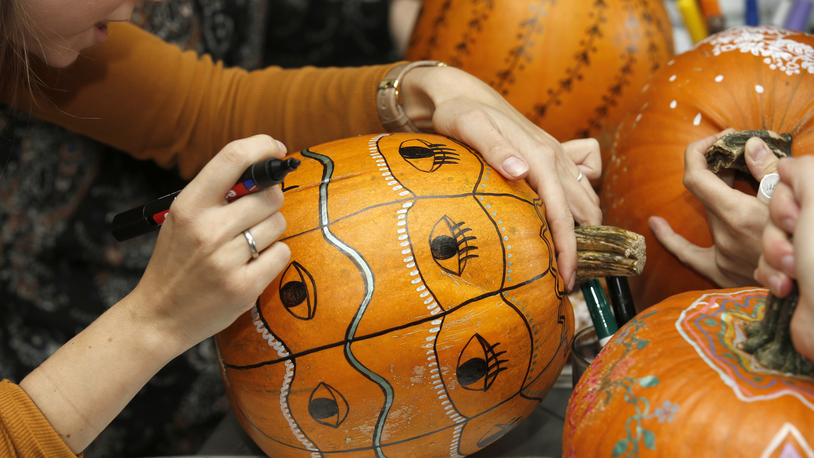 5 Ways To Nail Pumpkin Painting This Spooky Season