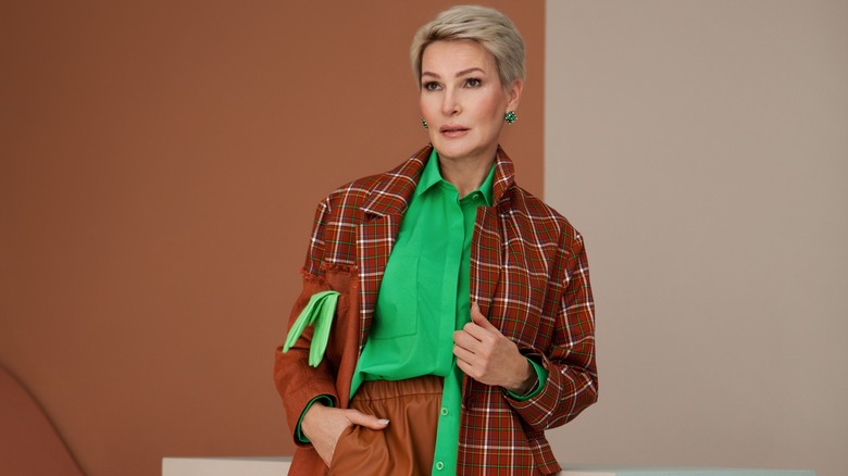 Woman wearing plaid jacket