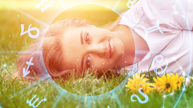 Woman laying in grass