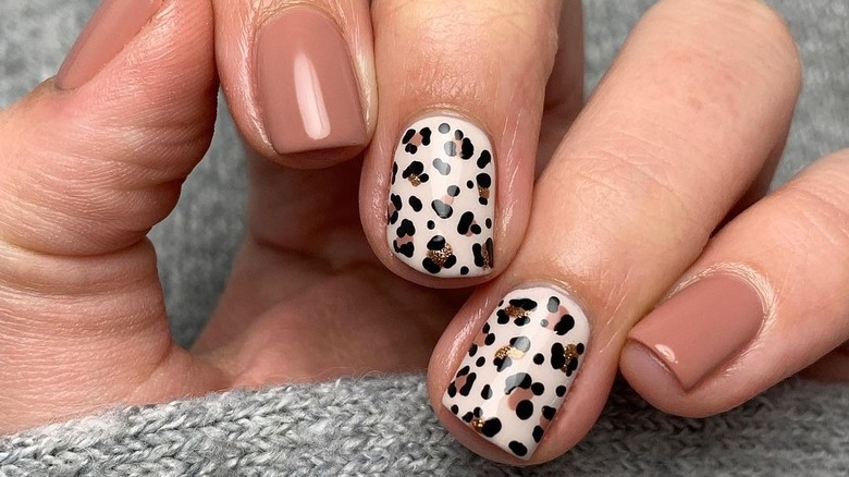 Taupe manicure with cheetah accents