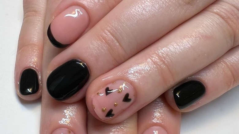 Black and nude nail art manicure