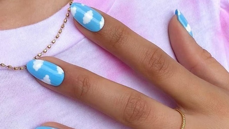 Blue sky with cloud nail art