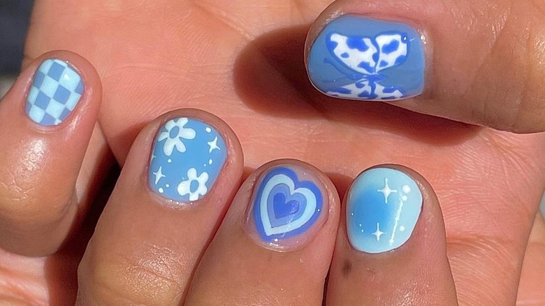 Blue nail art manicure