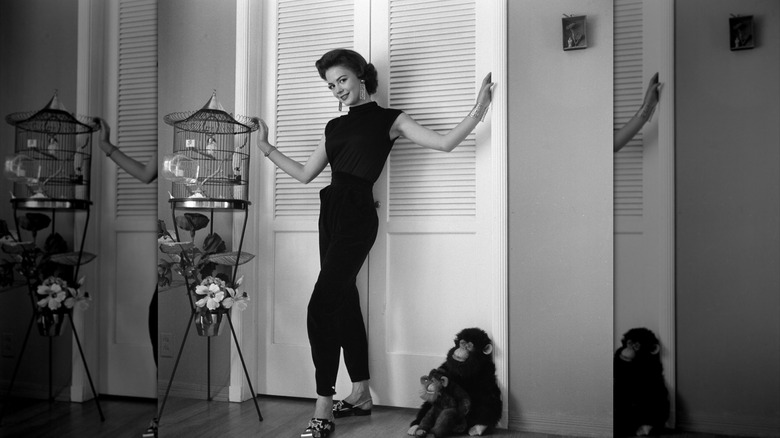 Natalie Wood poses for a black-and-white portrait in her home.