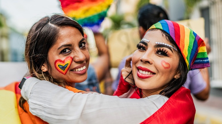 Women dressed up for Pride Month