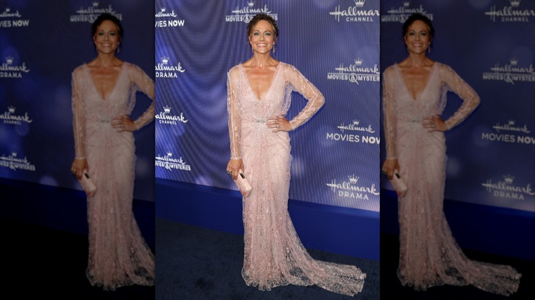 Nikki DeLoach wears a pink long-sleeved floral dress