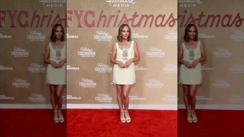 Nikki DeLoach wears a short yellow party dress with bows