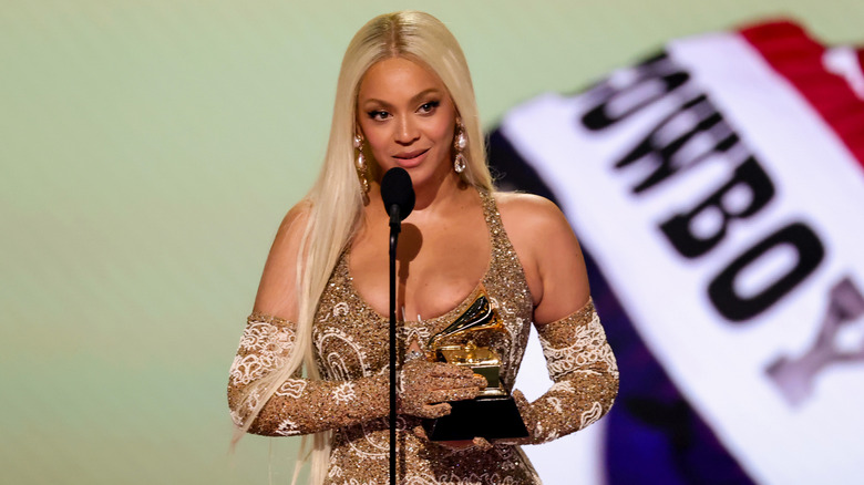 Beyoncé at the 2025 Grammys holding her award
