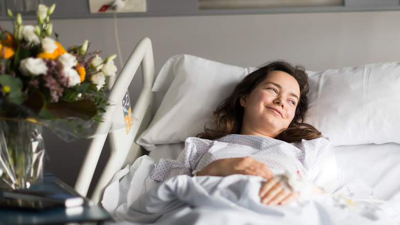 Woman in hospital bed