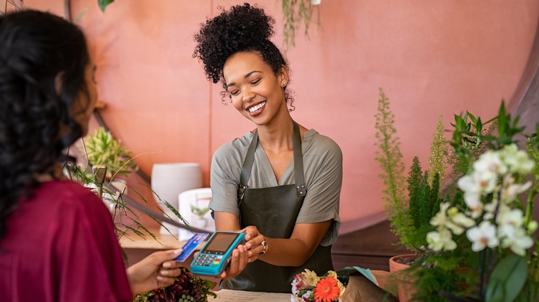 woman smiling at florist