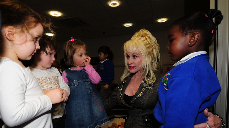 Country and western superstar singer Dolly Parton meets young schoolchildren at the Magna Science And Adventure Park on December 5, 2007