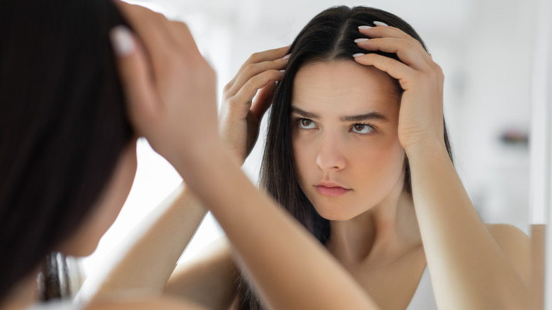 woman looking at scalp