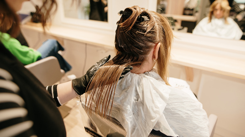 Woman getting her hair colored