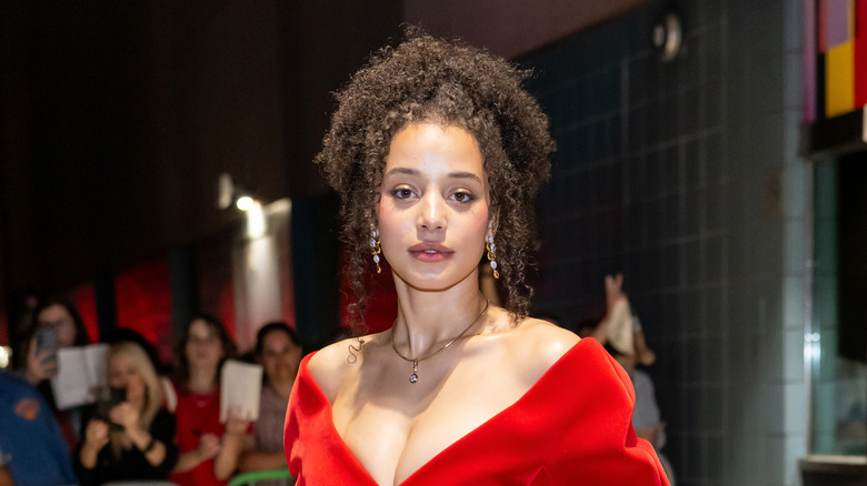 Chase Infiniti wearing a red dress