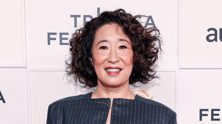 Sandra Oh wearing red lipstick