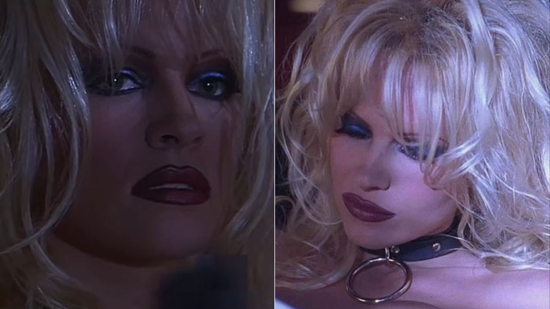 Pamela Anderson in "Barb Wire" wearing blue eyeshadow and dark red lipstick