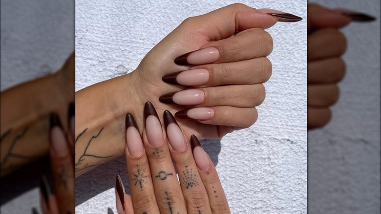 Long almond-shaped French manicure with brown tips