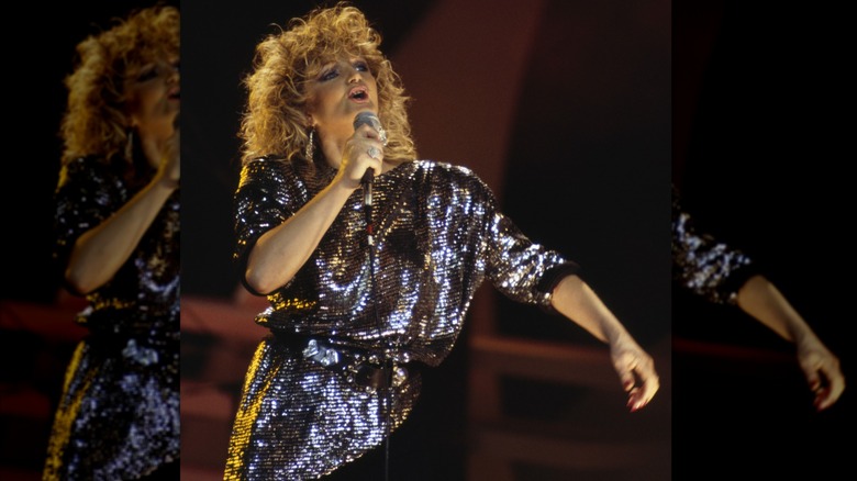 Bonnie Tyler wearing a sequin outfit in 1986