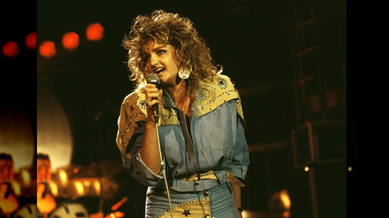 Bonnie Tyler wearing a denim-on-denim outfit at the Montreux Rock Festival in 1986