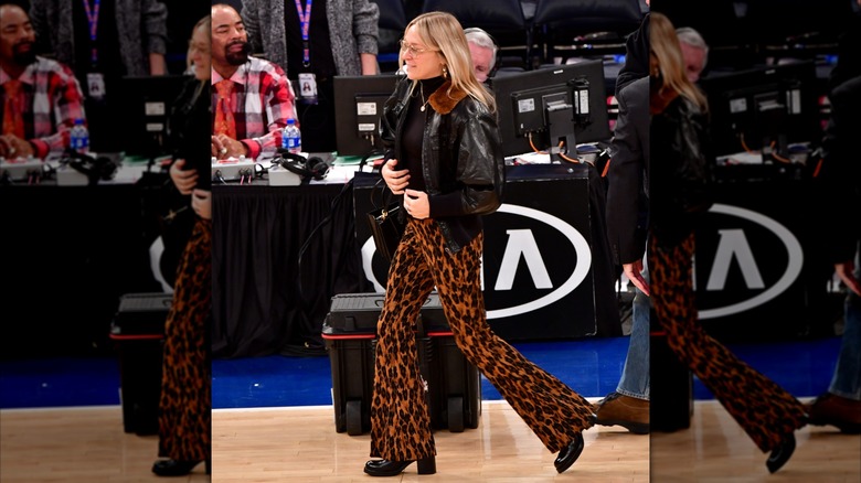 Chloe Sevigny wearing leopard print pants