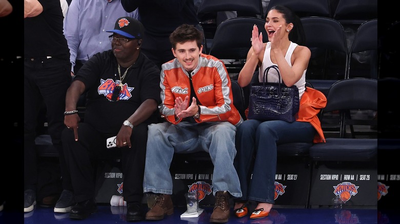 Timothee Chalamet and Kylie Jenner clapping