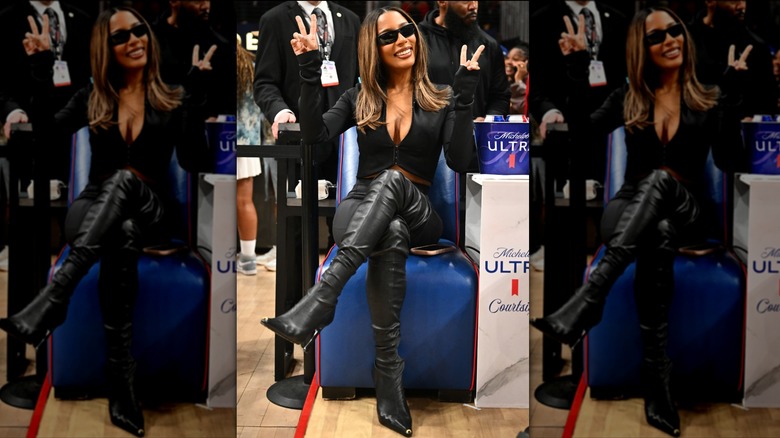 Victoria Monet wearing all black