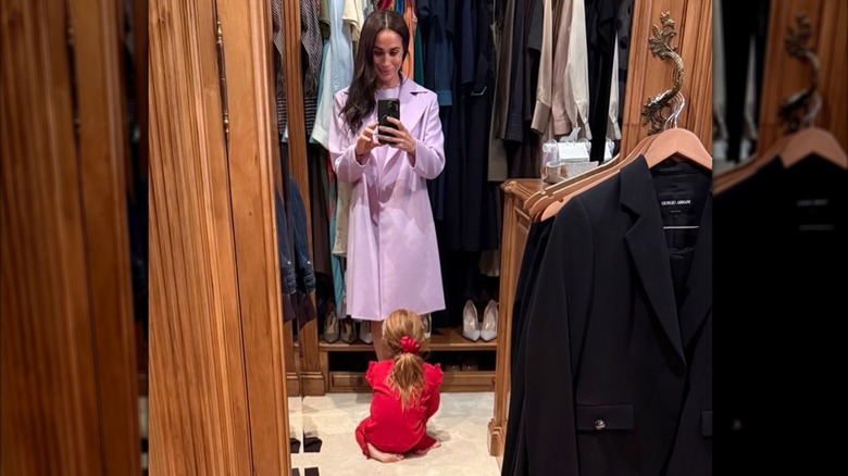 Meghan Markle and Lilibet in her closet.