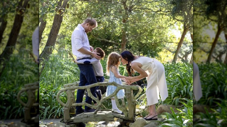 A photo of Meghan Markle, Prince Harry, Lilibet, and Archie.
