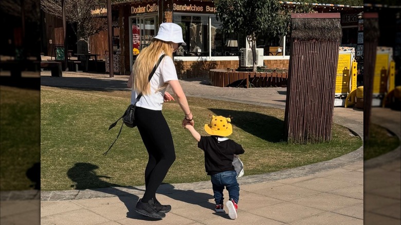 Lindsay Lohan holds hands with son Luai