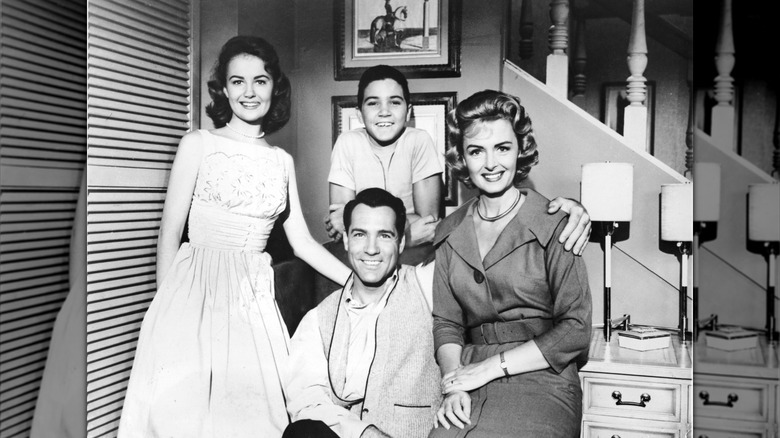 Shelley Fabares in a light dress, Paul Peterson, Carl Betz, and Donna Reed for "The Donna Reed Show" in 1961.