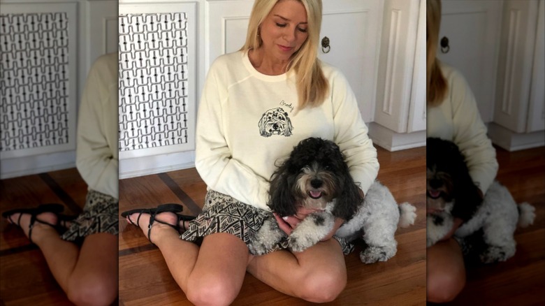 Pam Bondi poses with her dog