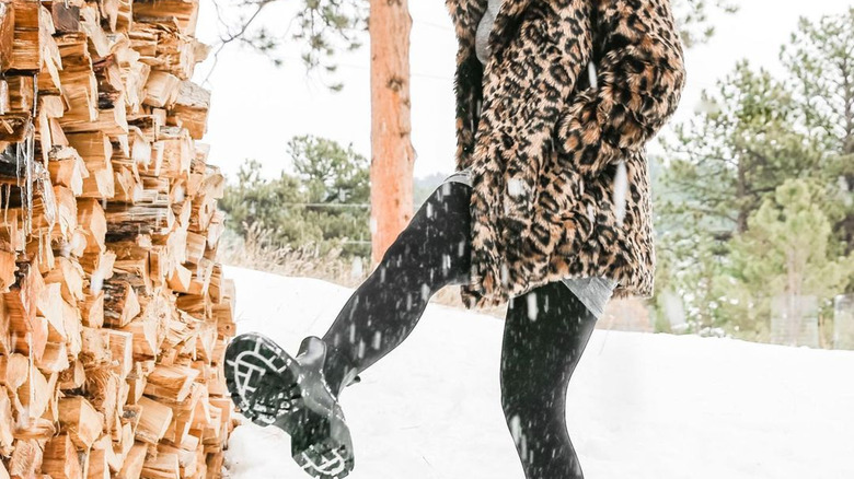 combat boots in the snow