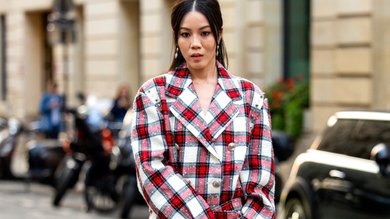 Jenny Tsang wearing red and white plaid 