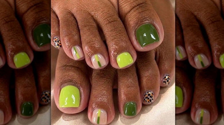 Close up to a greens and leopard print pedicure