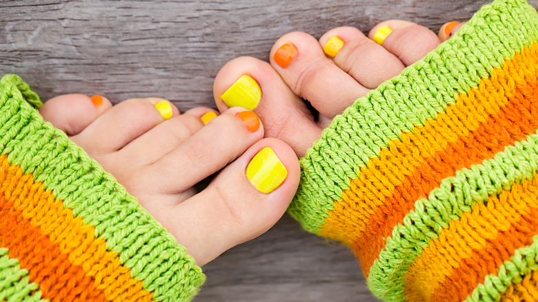 yellow and orange pedicure