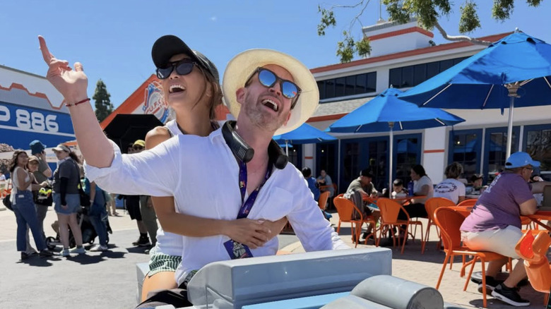 Macaulay Culkin and Brenda Song on a ride at Legoland.