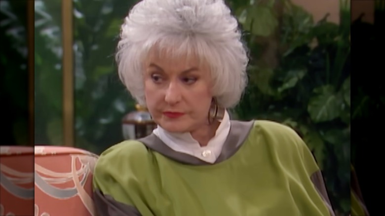 Bea Arthur wearing a lime green sweater