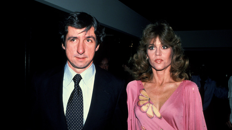 Tom Hayden and wife Jane Fonda walk side by side in 1979