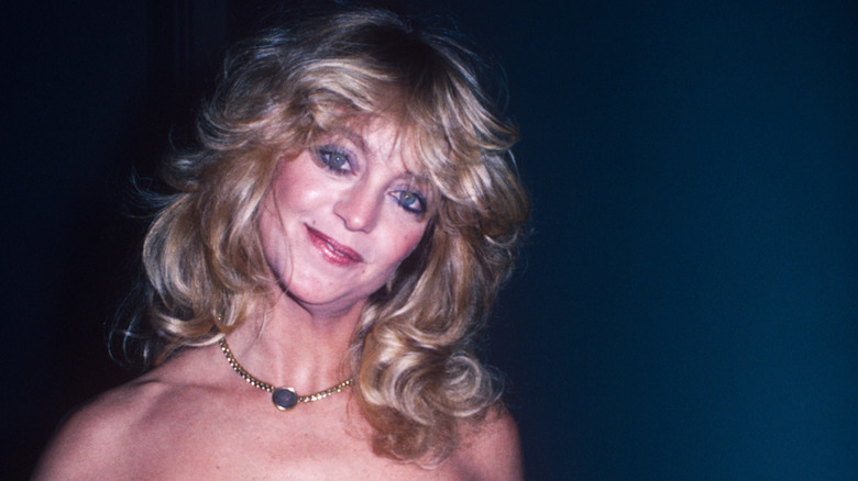 Goldie Hawn wearing blush and a bold lip