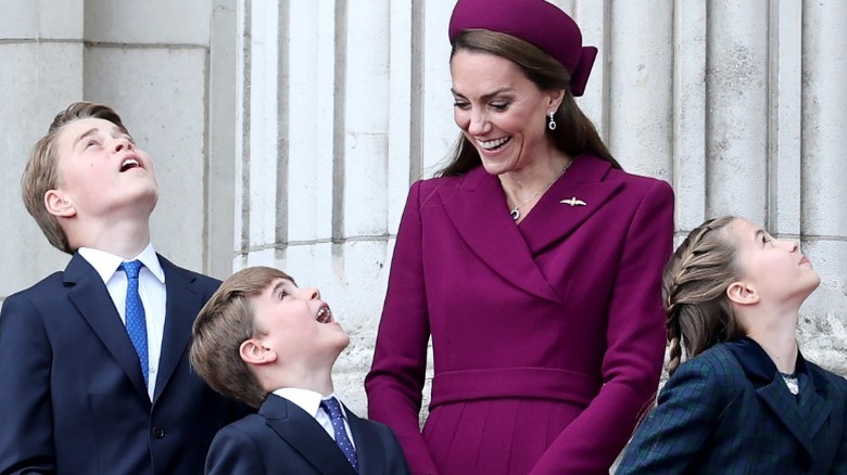 Kate Middleton with Louis, George, and Charlotte outside Buckingham Palace
