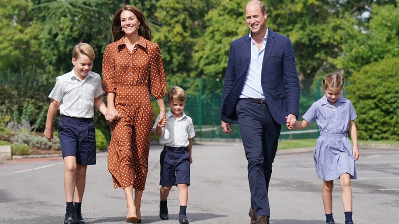 Kate Middleton and Prince William walk their three children to school