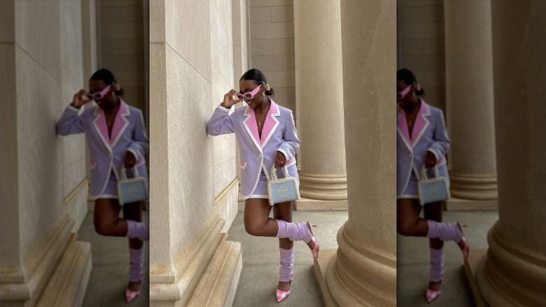 woman wearing bright leg warmers