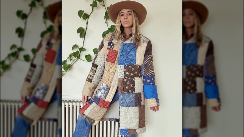 Girl wearing long quilted jacket