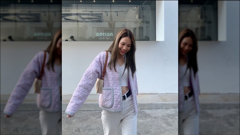 Girl wearing purple quilted jacket