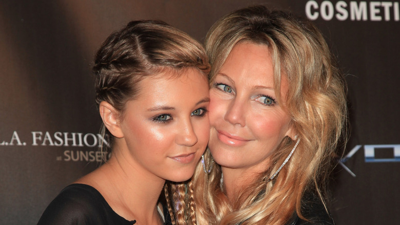 Heather Locklear and Ava Sambora pose cheek to cheek on the red carpet