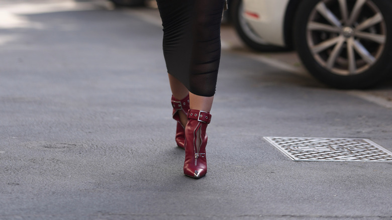 Woman wearing red boots