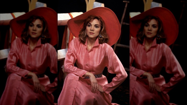 Kim Cattrall wearing an all-pink outfit with a wide-brimmed hat in "Mannequin."