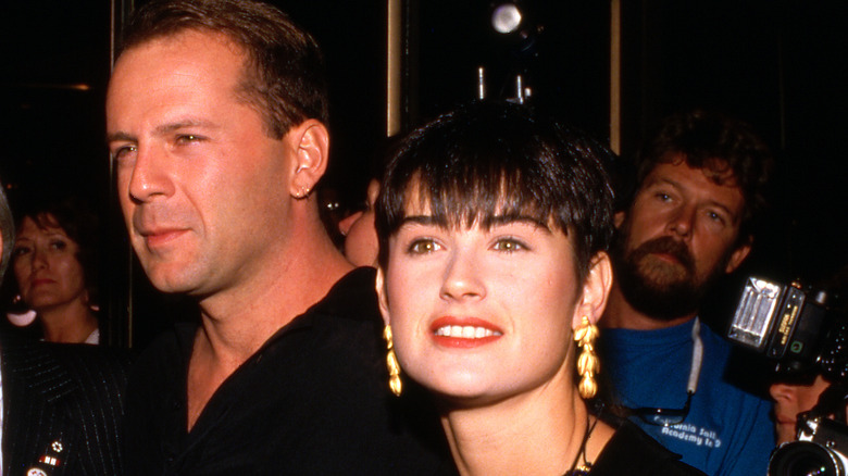 Bruce Willis and Demi Moore in the '80s wearing black