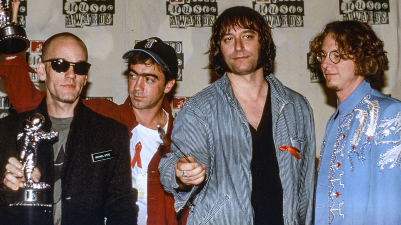 REM posing on the red carpet at the MTV Music Video Awards.